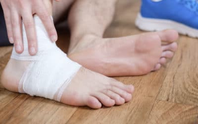 Close-up of a person with a bandaged ankle.